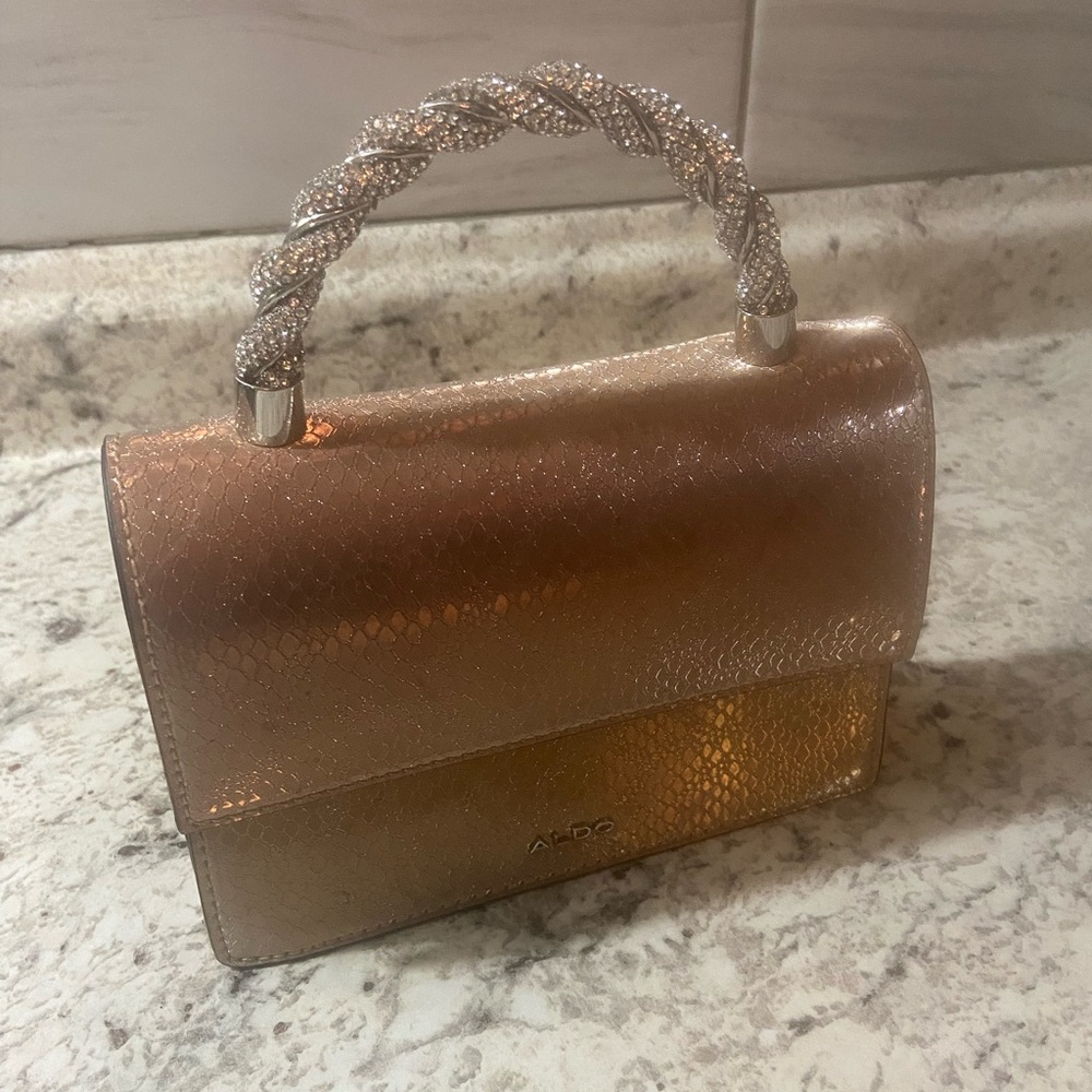 Aldo Metallic Gold Clutch with Braided Handle